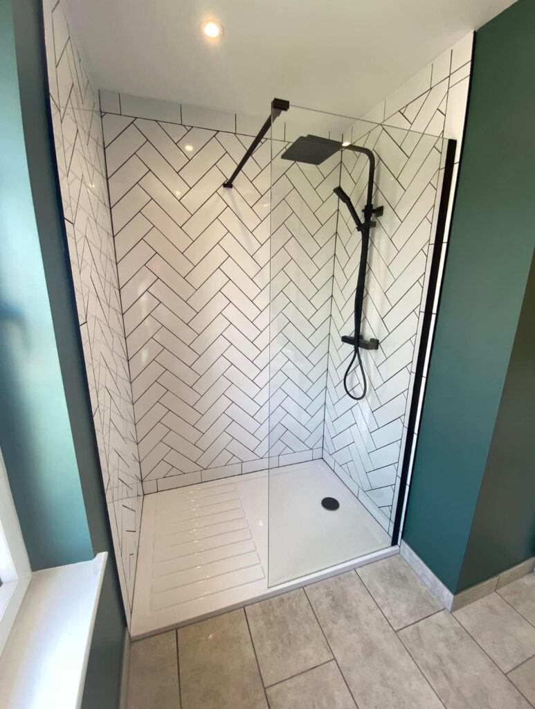 Shower with herringbone tiling
