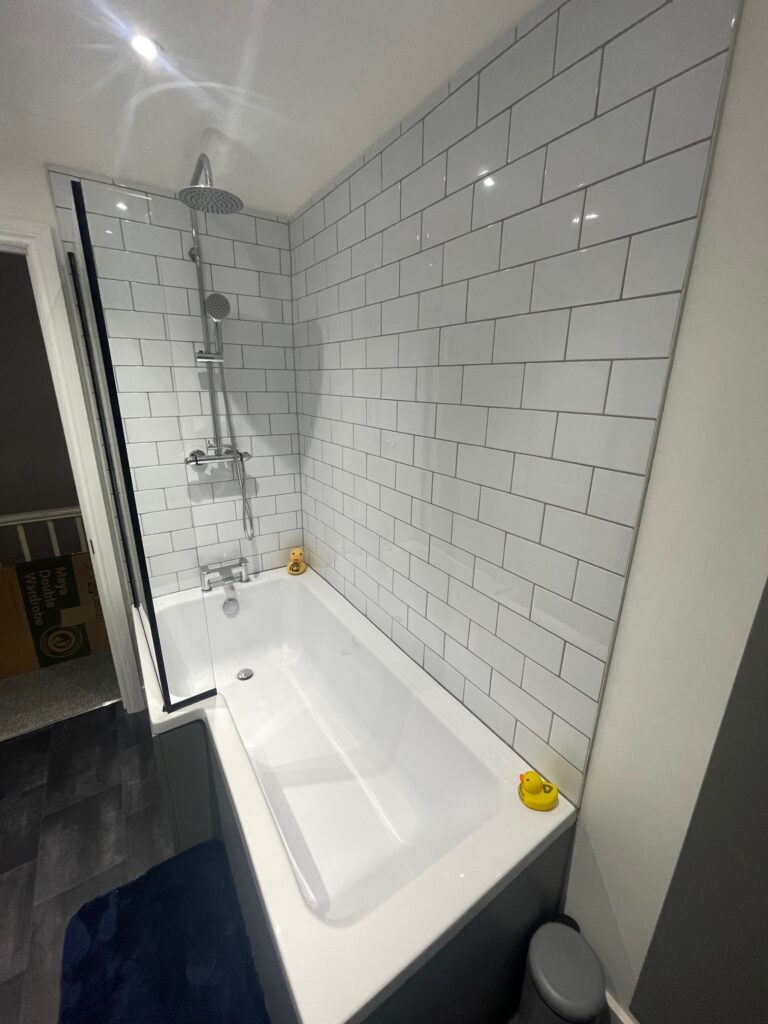 Brand new fitted bath with shower designed and fitted by Dymchurch Improvements.