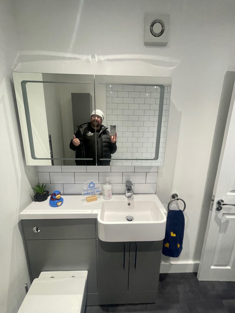 Brand new tiling, fitted sink and mirror from Dymchurch Improvements