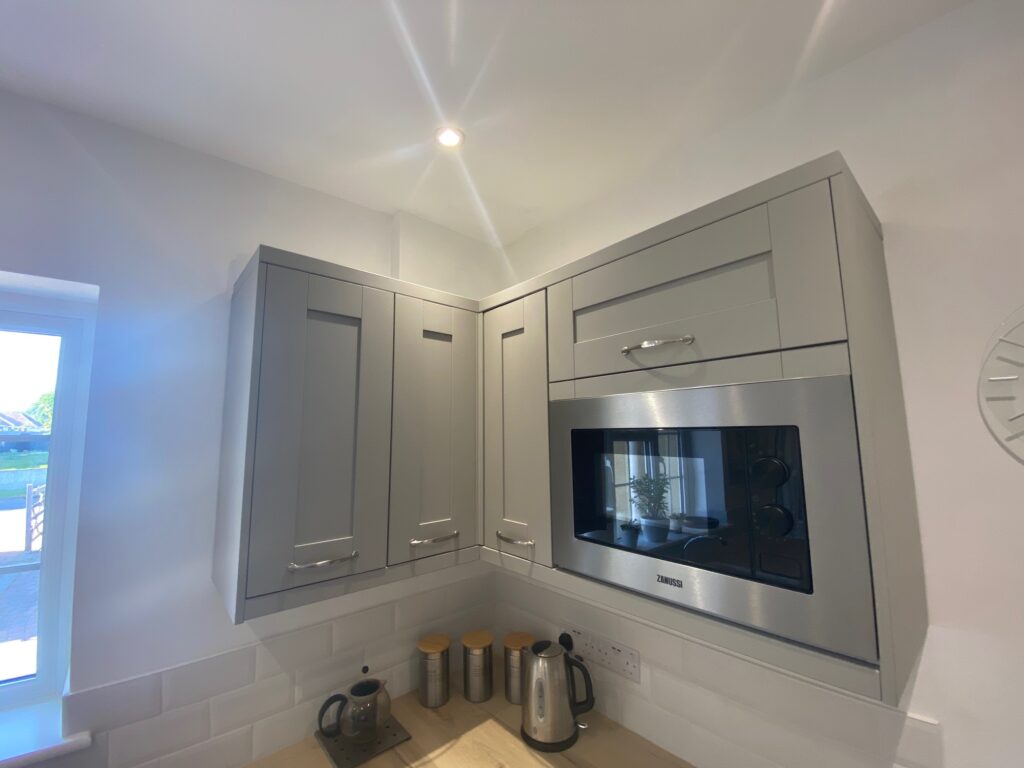 Dymchurch Improvements fitted this storage space and Microwave housing for this Dymchurch Kitchen project.