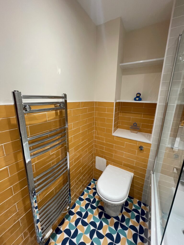 A brand new towel rail fitted on this bathroom project by Dymchurch Improvements