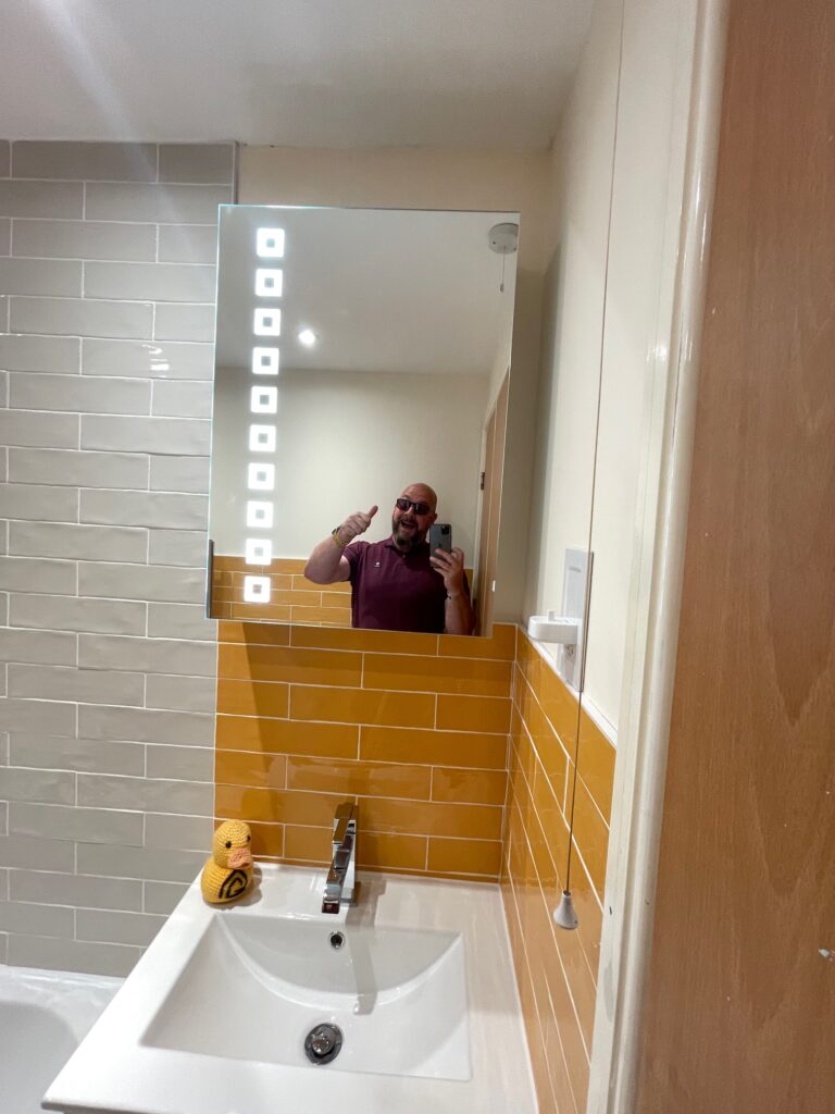 The mirror being the final touch for this bathroom refurbishment project, carried out by Dymchurch Improvements