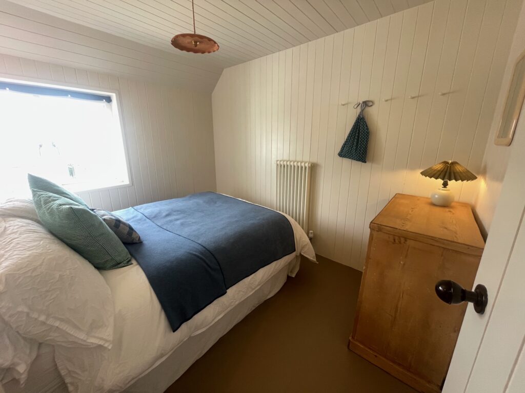 A renovated bedroom which is cosy and modernised from Dymchurch Improvements.