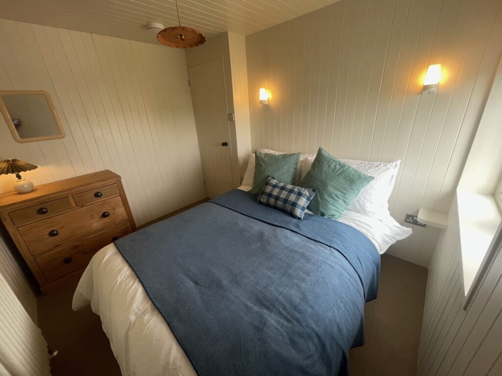 A cosy bedroom renovated by Dymchurch Improvements.