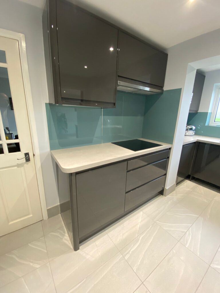 This new fitted kitchen from Dymchurch Improvements includes a hob and extractor.