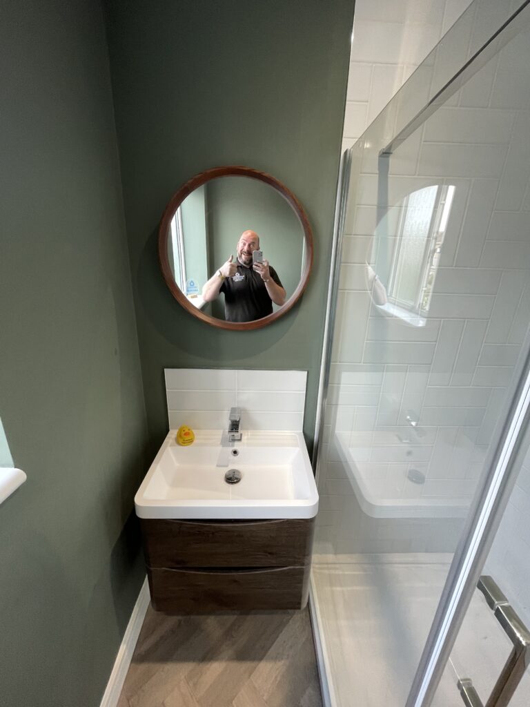 A beautiful new sink and fitted mirror for this bathroom renovation by Dymchurch Improvements.